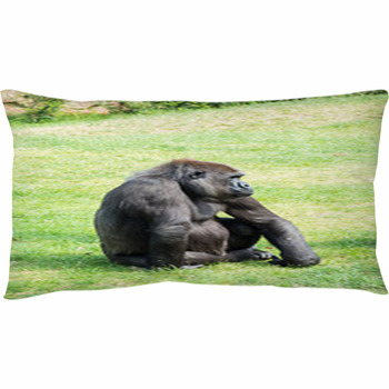 Throw Pillow A large male silver of back gorilla sitting 