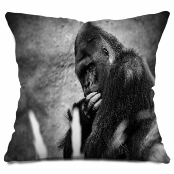 Gorilla male silverback great ape of Africa sitting in green jungle bushes  Throw Pillow